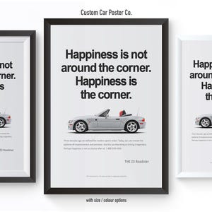 May include: Three framed posters with the text "Happiness is not around the corner. Happiness is the corner." Each poster features a silver convertible car with a red interior. The posters are in black and white frames.