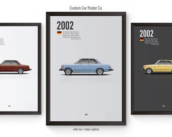 May include: Three framed posters featuring a vintage car, the BMW 2002, in three different colors: red, blue, and yellow. Each poster has the year "2002" and the German flag printed on it. The posters are set against a white background.