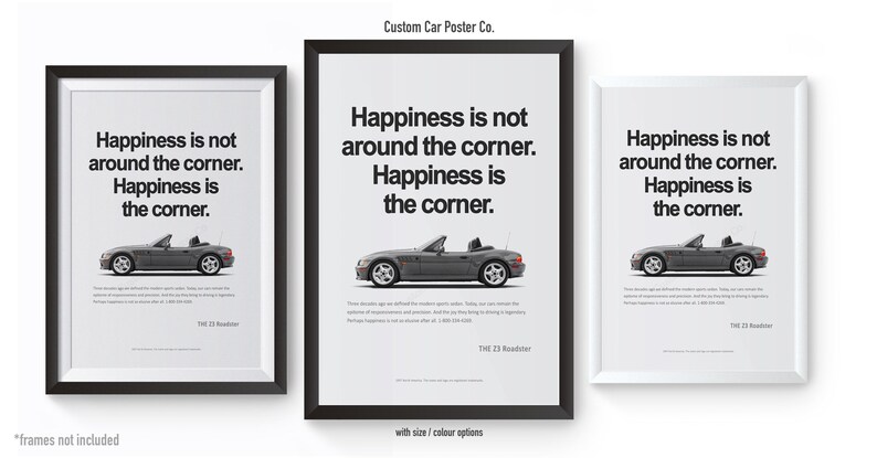 May include: Three framed posters with a minimalist design. Each poster features a gray convertible car and the text "Happiness is not around the corner. Happiness is the corner." The posters are in black and white frames.
