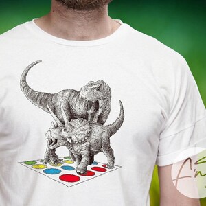 Funny &quot;Dinosaur Twister&quot; Tee Shirt - T-Rex vs Triceratops Hilarious Game T-Shirt - Unique Prehistoric Humor Gift for Dino Lovers