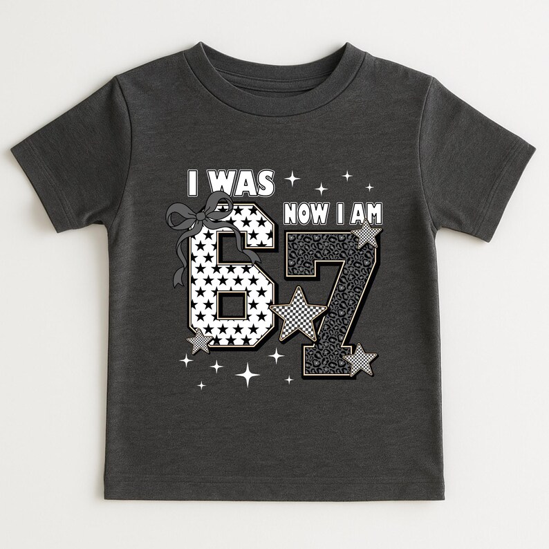 A bright and cheerful image of a girl wearing heart sunglasses and her special birthday shirt. The focus is on the shirt's message about growing up. The mix of patterns (stars, leopard, checks) makes it a unique piece of apparel. Parents looking for "7th birthday girl shirt" or "seven year old gift" will find this design appealing for its modern and cute aesthetic.
