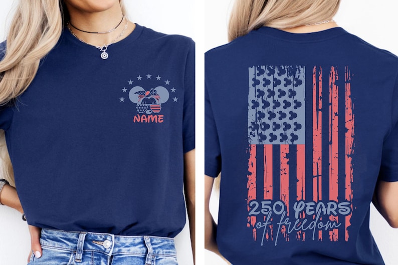 A woman wearing a navy blue t-shirt with a graphic design on the back featuring an American flag and the text "250 years of freedom".
