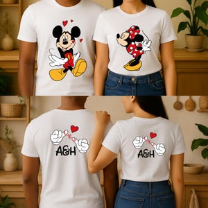 Celebrate love with these adorable matching designs created for couples who enjoy cartoon-themed apparel. The artwork is bold, cute, and printed with high-quality direct-to-garment technology for long-lasting color. Choose between t-shirt, sweatshirt, or hoodie options. Add personalized initials on the sleeve to turn this into a special keepsake for anniversaries or holidays.