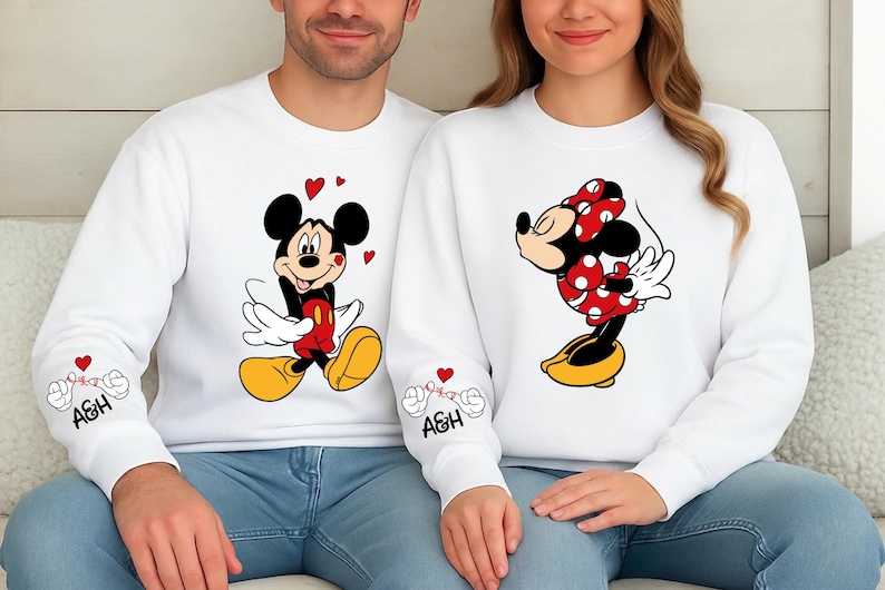 These couples tops are perfect for gifting or wearing together on special occasions. The cute character illustrations stand out on soft, durable fabric that feels great all day long. Whether you’re planning a trip, taking holiday photos, or simply want coordinated matching outfits, this set is the ideal choice. Customize the sleeve initials to make it personal.