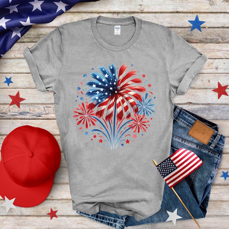 a t - shirt with an american flag and fireworks