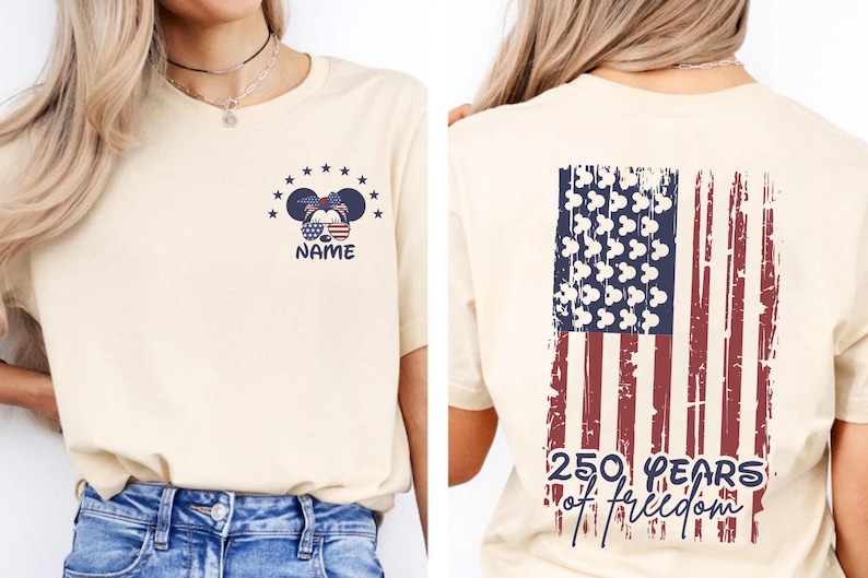 A woman wearing a beige t-shirt with a graphic design on the back, depicting an American flag and the text "250 YEARS OF FREEDOM".