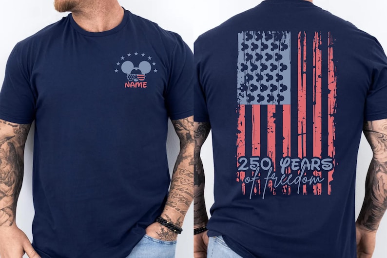 A navy blue t-shirt with a graphic design on the back, depicting an American flag and the text "250 years of freedom".