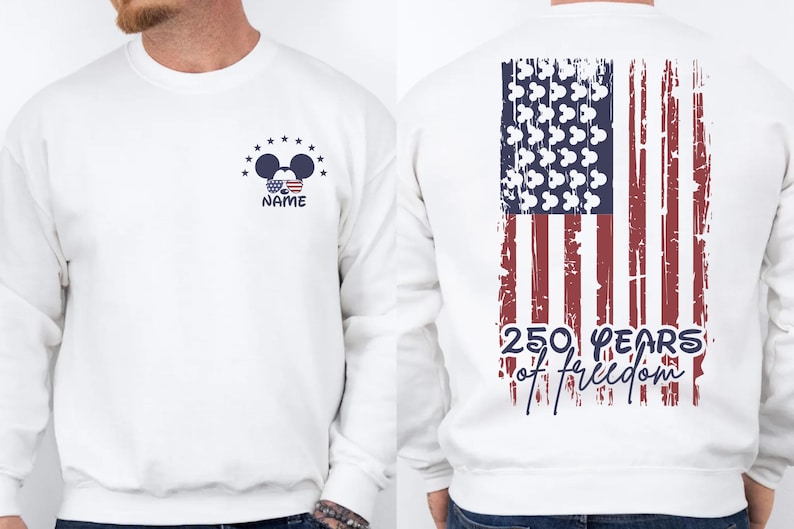 A white sweatshirt with an American flag design and the text "250 years of freedom" printed on the back.