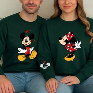 This cute matching couples design is a fun way to express love. Each piece is printed using high-quality techniques that ensure long-lasting artwork. Choose between shirts, sweatshirts, or hoodies. Add initials to the sleeve to create a custom piece that feels meaningful and thoughtful for your partner.