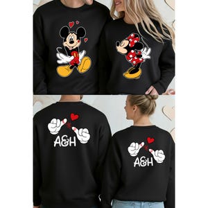 The image is a collage of four images featuring a man and a woman wearing matching black sweatshirts with a Mickey Mouse design.