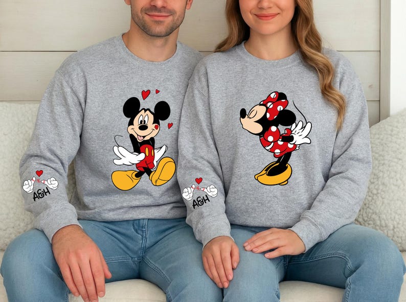 These charming couple designs are ideal for celebrating love with a playful twist. The tops are made from soft, cozy fabric and are available as shirts, hoodies, or sweatshirts. The artwork captures a sweet and romantic vibe, perfect for photos or gifting. Add personalized initials on the sleeve to create a unique couple’s outfit.
