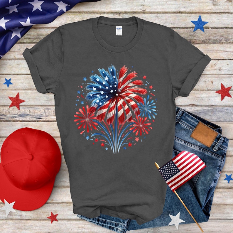 a t - shirt with an american flag and fireworks