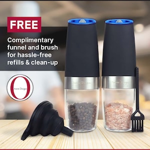 May include: Two black electric salt and pepper grinders with blue accents. The grinders are filled with black peppercorns and pink Himalayan salt. A black silicone funnel and a black brush are included.