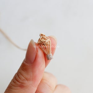 Gold Dipped Hot Air Balloon Pendant Necklace: Crystal Paved Basket Charm