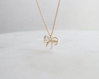 TIESOME Collana Donna Con Ciondolo Fiocco In Oro – Girocollo Regolabile In Acciaio Al Titanio, Gioiello Elegante E Minimal