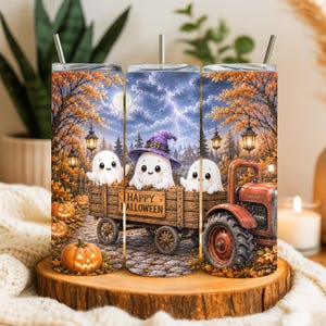 May include: A cylindrical stainless steel tumbler featuring a Halloween scene with three white ghosts riding in a wooden wagon pulled by a red tractor. The design includes orange pumpkins, autumn trees, a full moon, lightning, and the text Happy Halloween.