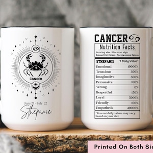 May include: White ceramic mug with black handle and rim, featuring a Cancer zodiac design. One side displays a crab illustration with the word "Cancer" and the name "Sthepanie". The other side has a "Nutrition Facts" table.
