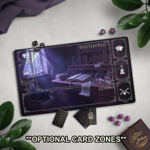May include: A rectangular black playmat with a detailed fantasy scene, labeled "Battlefield," "Lands," and other zones. Includes dice, cards, and the text "OPTIONAL CARD ZONES." The mat features a dark, gothic aesthetic with a library scene.