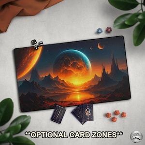 May include: A rectangular gaming mat with a fantasy landscape design, featuring planets, mountains, and a lake. The mat has the text "**OPTIONAL CARD ZONES**". Dice and playing cards are placed around the mat.