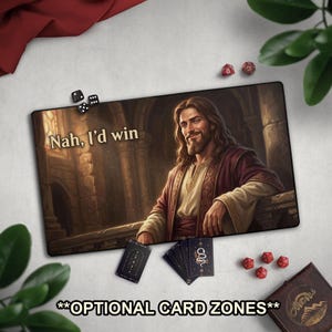 May include: A rectangular gaming mousepad featuring an illustration of a smiling Jesus with the text "Nah, I'd win." The pad includes optional card zones and is surrounded by dice and playing cards.