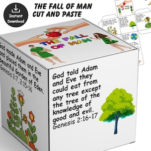 May include: A white cube with illustrations and text about the story of Adam and Eve. The cube features the text "THE FALL OF MAN CUT AND PASTE" and Bible verses. The cube has images of Adam, Eve, an apple, and a tree.