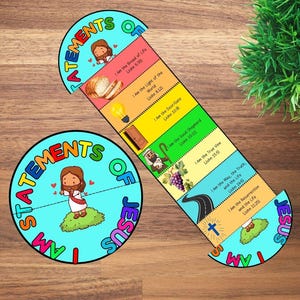 May include: A children's educational toy with the text "I AM STATEMENTS OF JESUS." The design includes a circular piece and a strip with illustrations and Bible verses such as "I am the Bread of Life." The background is a wooden surface.