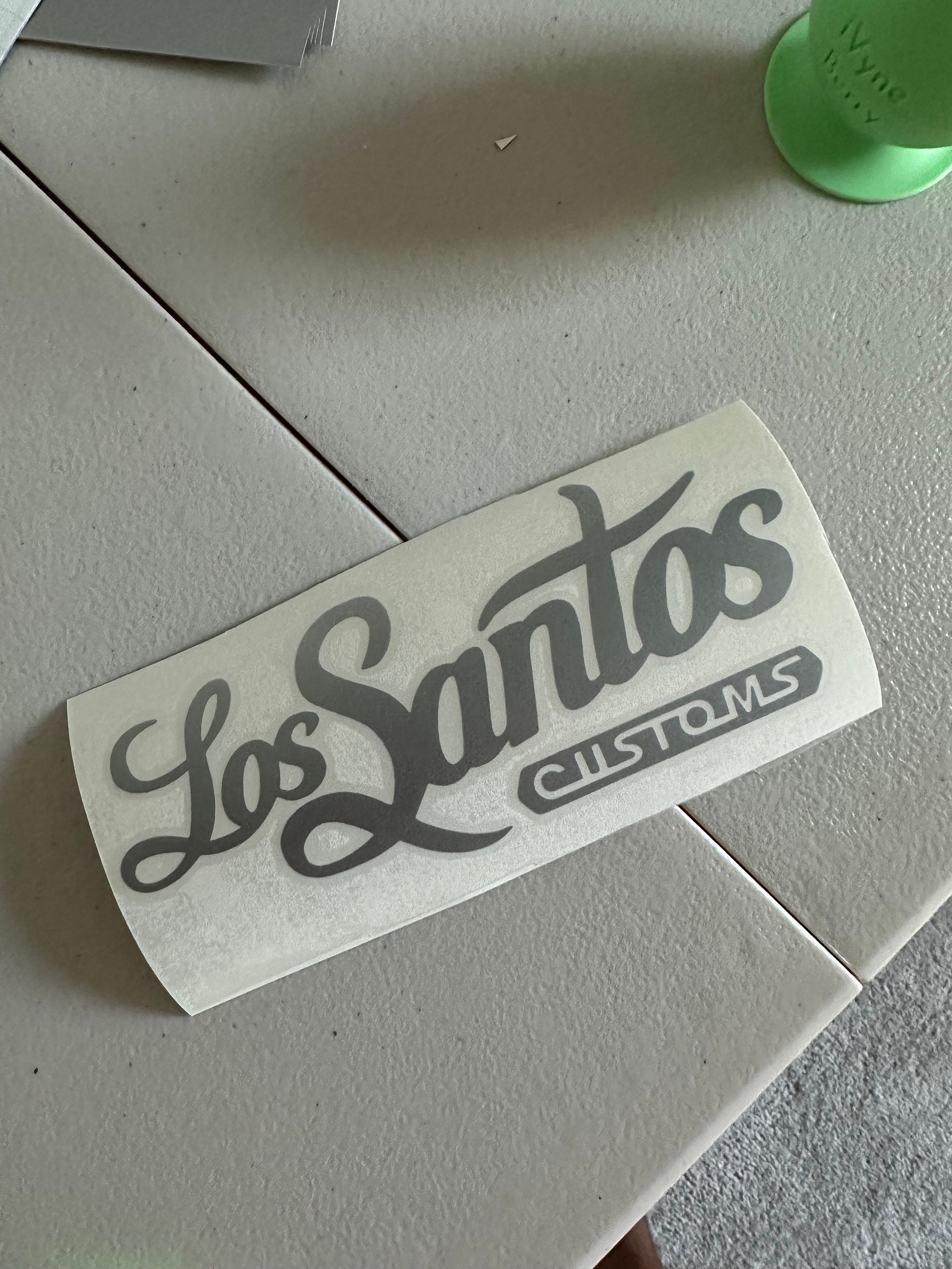 los santos customs Sticker for Sale by Rebass