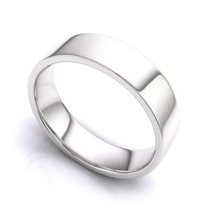 May include: A simple, polished silver wedding band with a flat, wide profile.