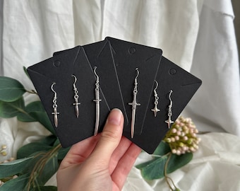 Different handmade earrings, sword earrings