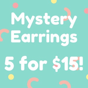 May include: A turquoise background with white text that reads "Mystery Earrings 5 for £15!"  There are pink and yellow circles and curved shapes scattered around the text.