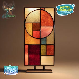 May include: A stained glass lamp with a geometric design. The lamp features a variety of colors, including gold, orange, red, and green. The design includes a large circle and several rectangular shapes. The base is a dark metal. The text "DIGITAL DOWNLOAD NO PHYSICAL ITEM WILL BE SHIPPED" and "BEGINNER FRIENDLY" are visible.