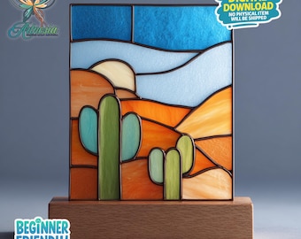 May include: Stained glass panel depicting a desert landscape with cacti, a sun, and mountains. The panel is set on a wooden base. The sky is blue, the desert is orange and yellow, and the cacti are green. The text "DIGITAL DOWNLOAD" and "BEGINNER FRIENDLY" are visible.