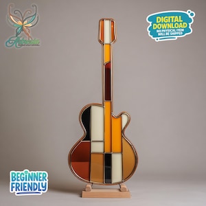 May include: A stained glass guitar with a copper frame, featuring a geometric design in shades of brown, orange, black, and white. The guitar is mounted on a wooden stand. The image includes the text "DIGITAL DOWNLOAD NO PHYSICAL ITEM WILL BE SHIPPED" and "BEGINNER FRIENDLY".