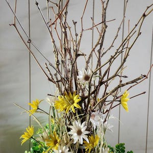 May include: A handmade wooden sign with the text "Welcome" in a playful font. The sign features a distressed white background and a dark brown frame, perfect for a front door or entryway. The sign measures approximately 12 inches wide and 6 inches tall.