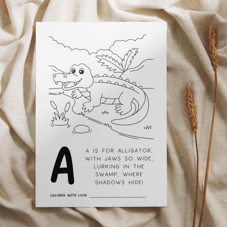 baby shower game for baby's first abc coloring book for guests to color in a page and keepsake for the baby