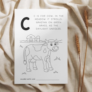 baby shower game for baby's first abc coloring book for guests to color in a page and keepsake for the baby