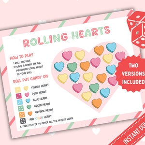 May include: A printable game board for a Valentine's Day party. The game is called "Rolling Hearts" and involves rolling a die and placing candy hearts on the board. The board is pink with a large heart shape in the center. The heart is filled with smaller hearts in various colors, including yellow, pink, blue, green, orange, and red. The game instructions are printed on the left side of the board. The text "Two Versions Included" is printed in a red circle on the right side of the board.