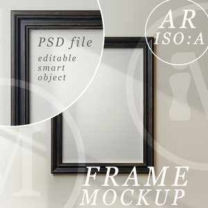 May include: A black picture frame mockup with a white background. The frame is on a wall with a shadow from a window. The text "PSD file editable smart object" is on the frame. The text "FRAME MOCKUP" is below the frame. The text "AR ISO:A" is in the upper right corner of the image.