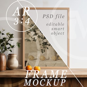 May include: A wooden frame mockup with a painting of a still life with lemons and flowers. The frame is on a wooden shelf with a vase of greenery and two ceramic jugs.