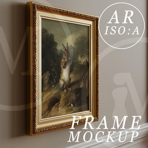 May include: A framed painting of a group of rabbits in a forest setting. The frame is gold with ornate detailing. The painting is in a traditional style and features a light brown rabbit in the center of the image.