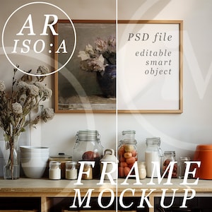 May include: A wooden frame mockup with a white background and the text "PSD file editable smart object". The frame is on a countertop with various jars and a bright orange kettle.