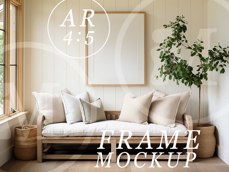 May include: A white couch with beige pillows sits in a room with white walls and wood paneling. A large, empty picture frame hangs above the couch. A potted plant with green leaves stands to the right of the couch. The text "FRAME MOCKUP" is printed in white on the floor in front of the couch.