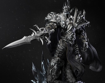 May include: A detailed silver and black figurine of a fantasy character wielding a sword, standing on a frozen ice base.