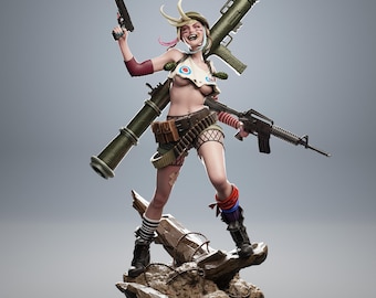 May include: A detailed figurine of a female character in a military-inspired outfit, holding a pistol and a rifle. She has a rocket launcher on her back. The figure is standing on a rocky base, with a playful expression. The color palette includes greens, browns, and skin tones.