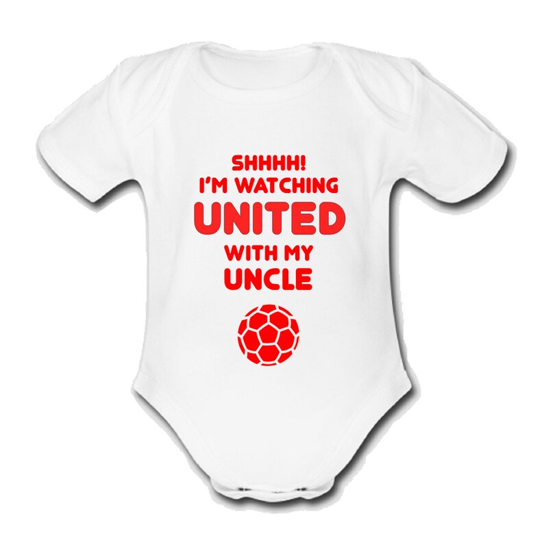 May include: White baby grow with red text that reads "Shhhh! I'm watching United with my Uncle" and a red football graphic.