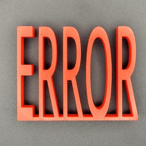 May include: A red plastic sign with the word "ERROR" in large, bold letters.