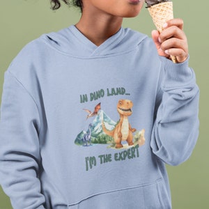 Hoodie mit Dino Baby - Dino Mode als Geschenk für Kinder und Dino Fan, mit Dinosaurier Pullover Kinder stärken, dino Bild T-Rex Bilder