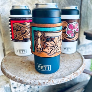 Yeti Koozie mit Ochsen und floralen Werkzeugen