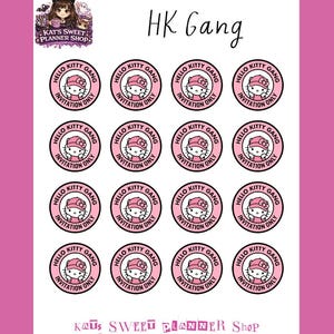 May include: A sheet of pink stickers featuring Hello Kitty in a pink circle with the text "Hello Kitty Gang" and "Invitation Only". The sheet also includes the text "HK Gang" and "Kat's Sweet Planner Shop".