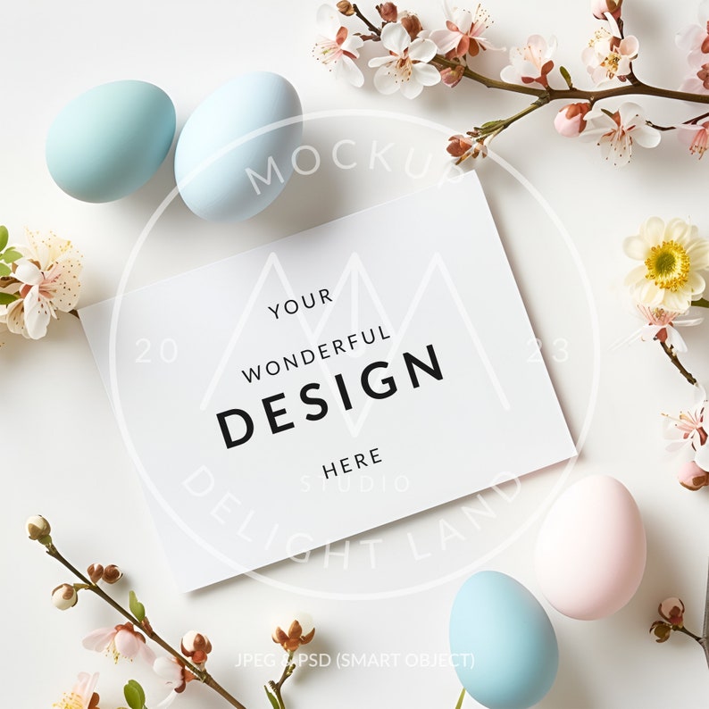 May include: A white card with the text "YOUR WONDERFUL DESIGN HERE" on a white background with pastel blue and pink Easter eggs and pink and white blossoms.